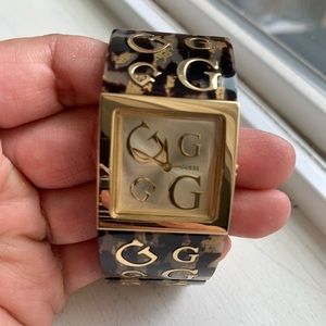 Women’s guess watch.